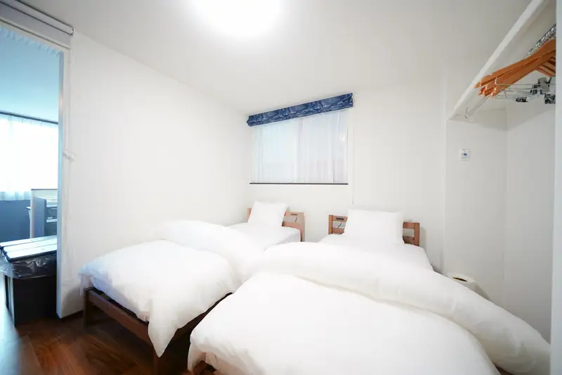 The three beds from the window side